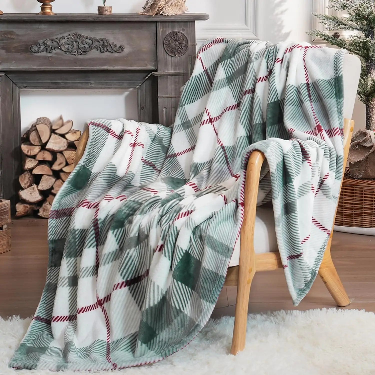 A green plaid blanket draped over a chair in a cosy room with a fireplace and logs.
