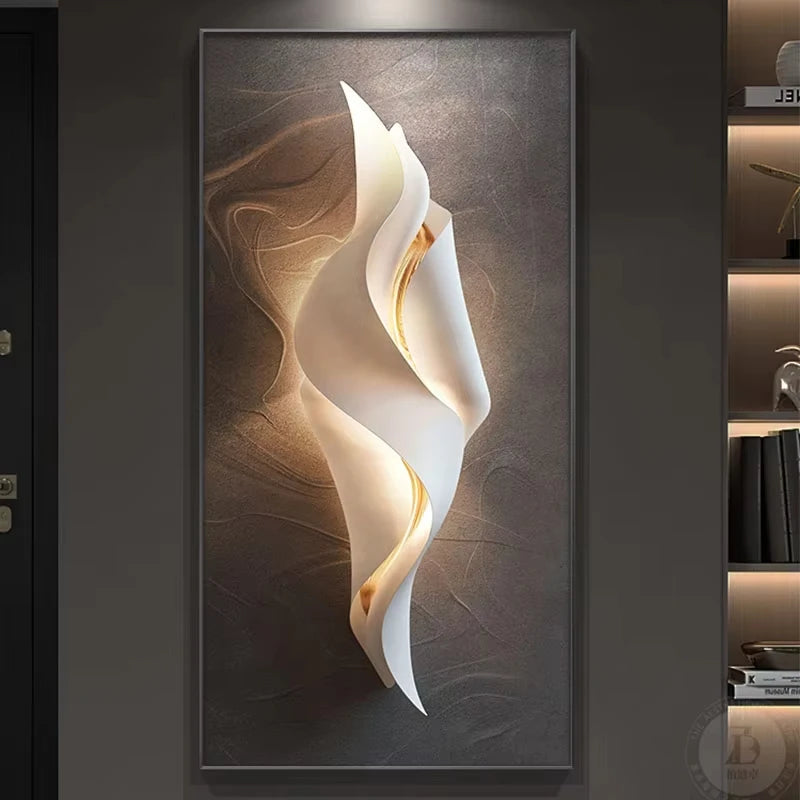 Lumina Flow LED wall art light with compact twisted white ribbon design and warm gold glow on a brown textured canvas