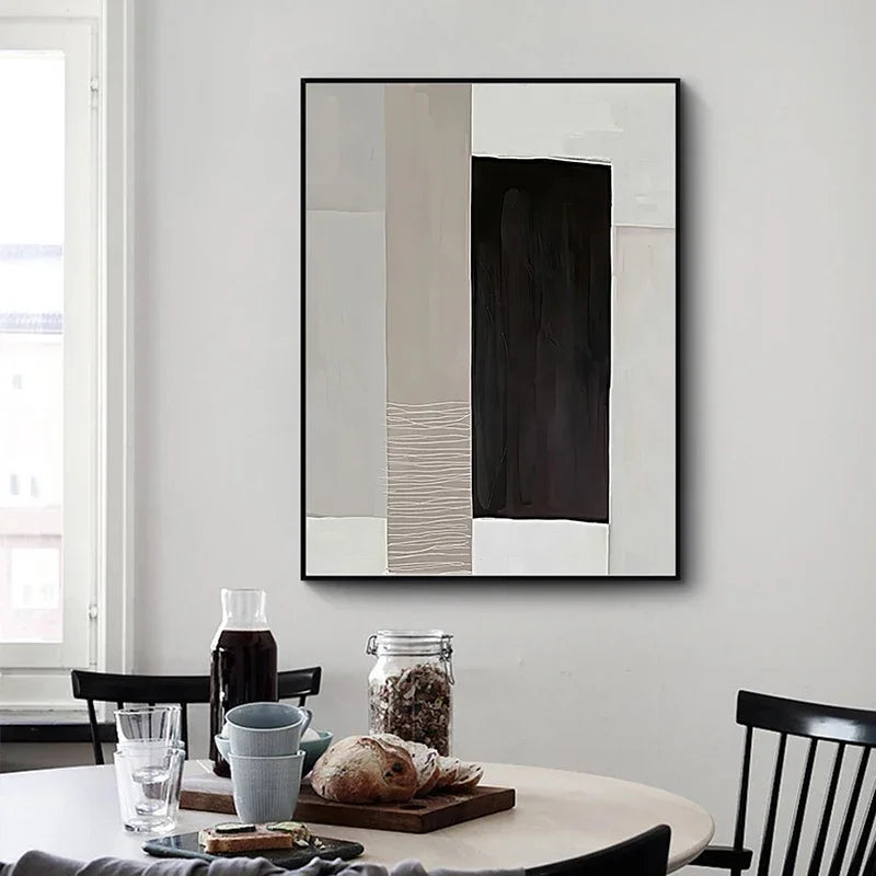 Abstract canvas print with beige, cream, and deep black blocks featuring textured vertical line detail.