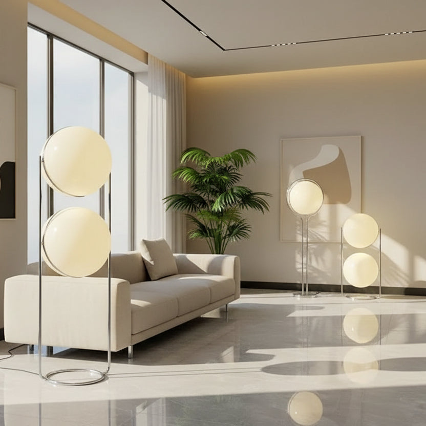 Modern floor lamps with spherical glass shades in a room setting.