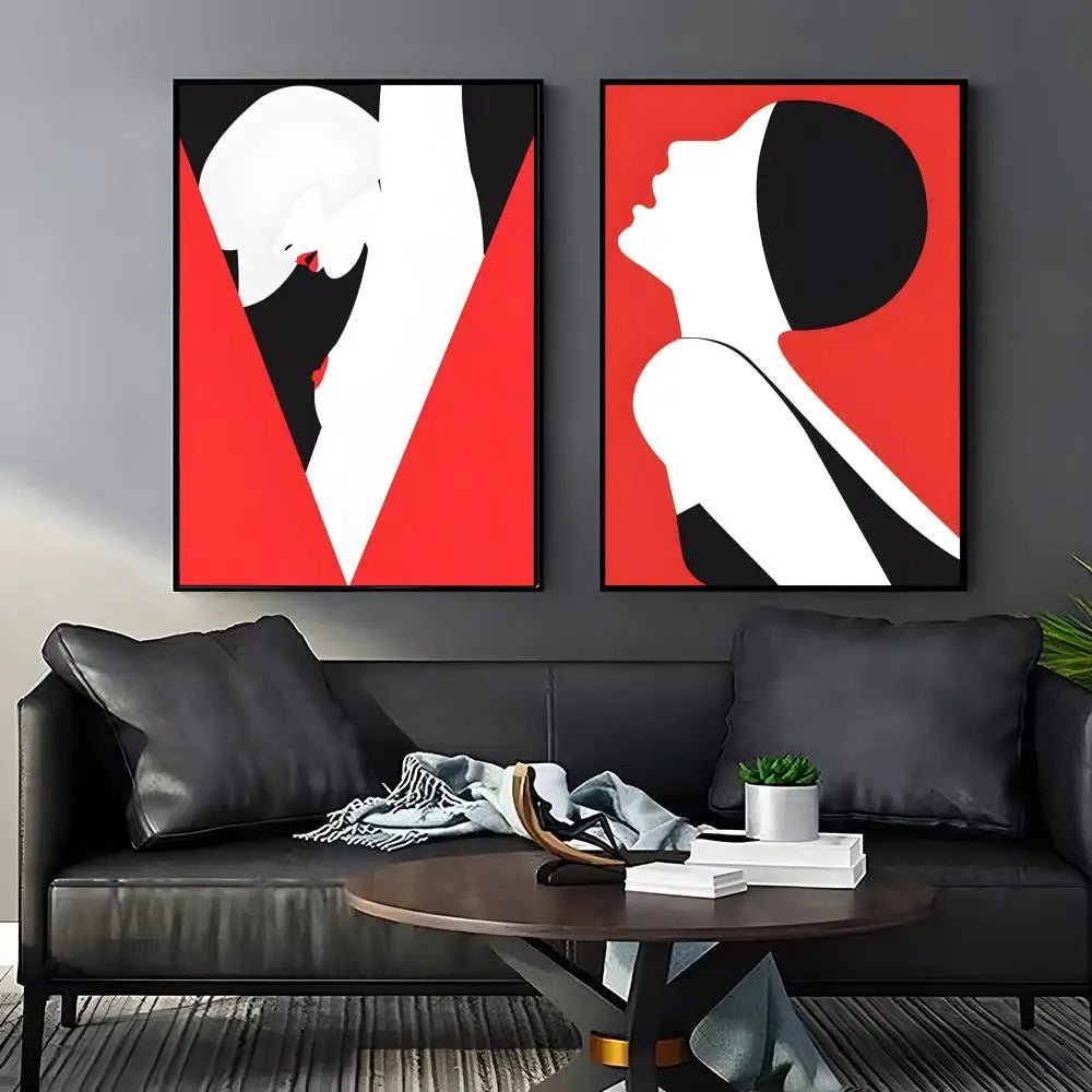 Two black, red, and white silhouette high contrast abstract prints.