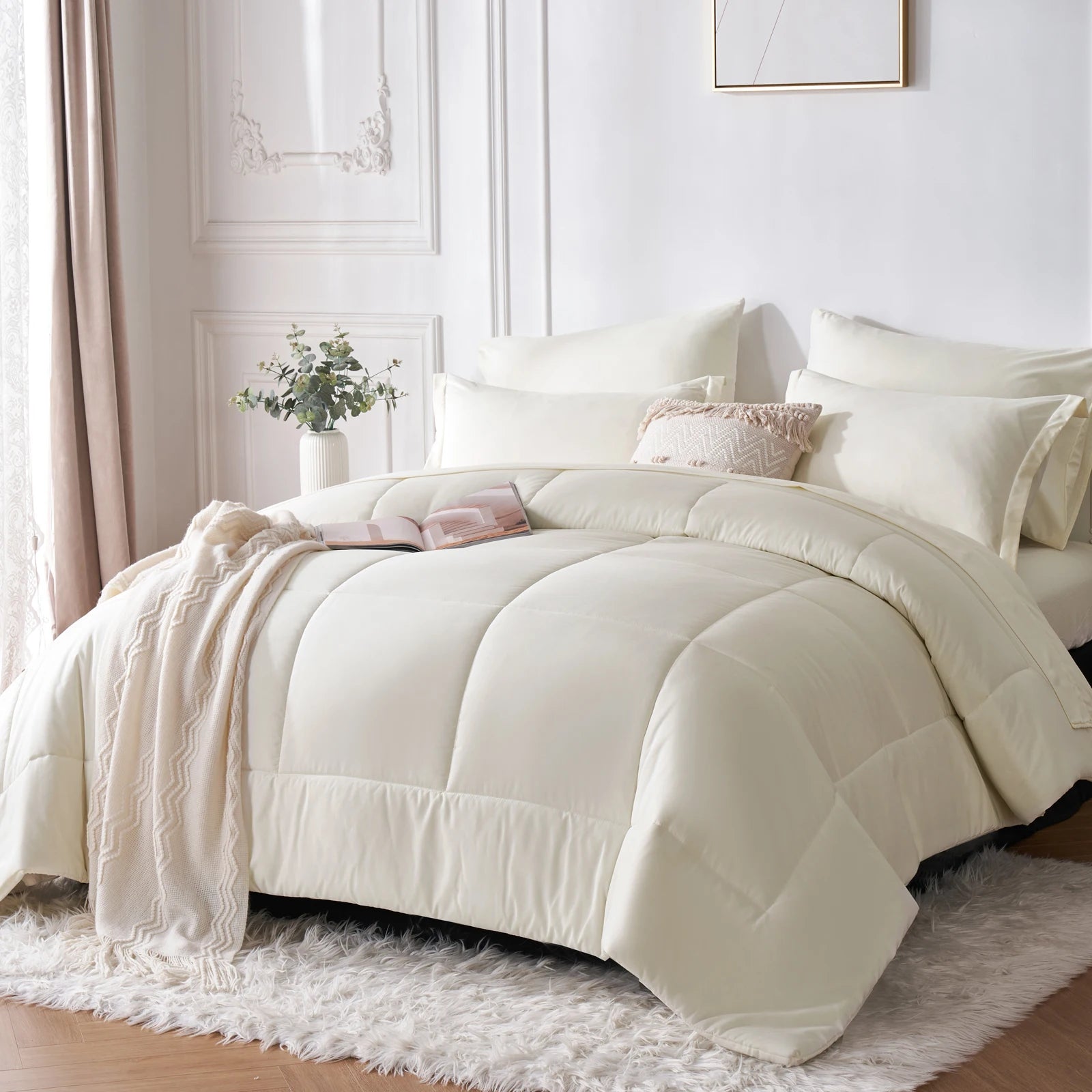 Neatly made bed with white bedding in a bright bedroom