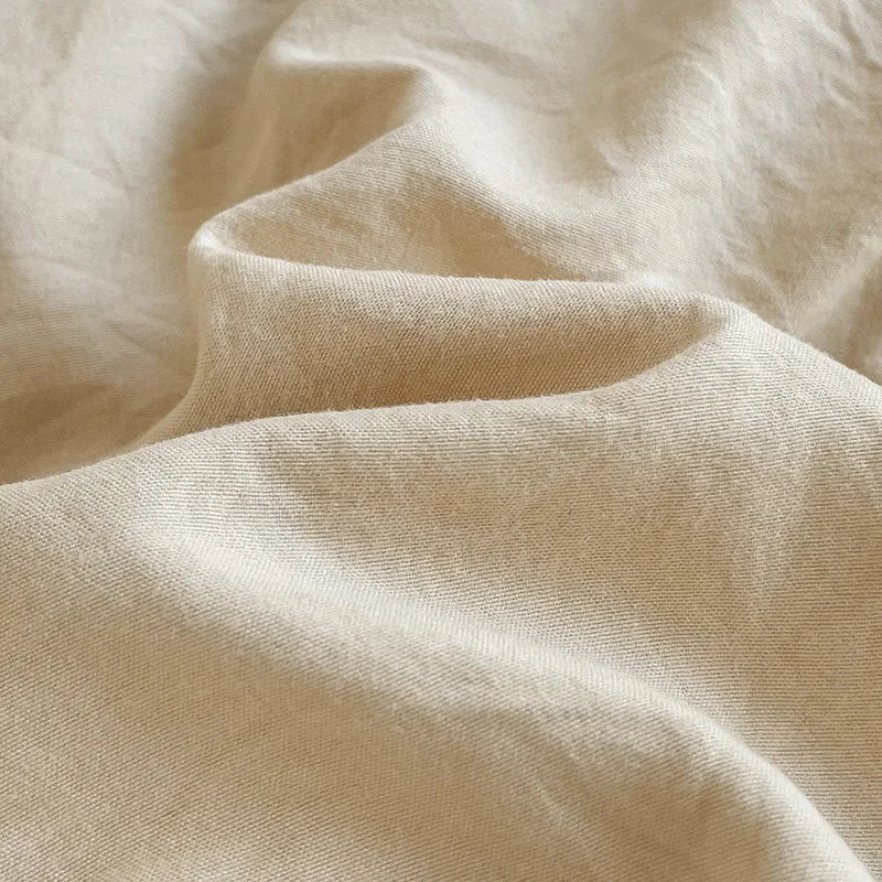 Close-up of beige fabric with soft texture