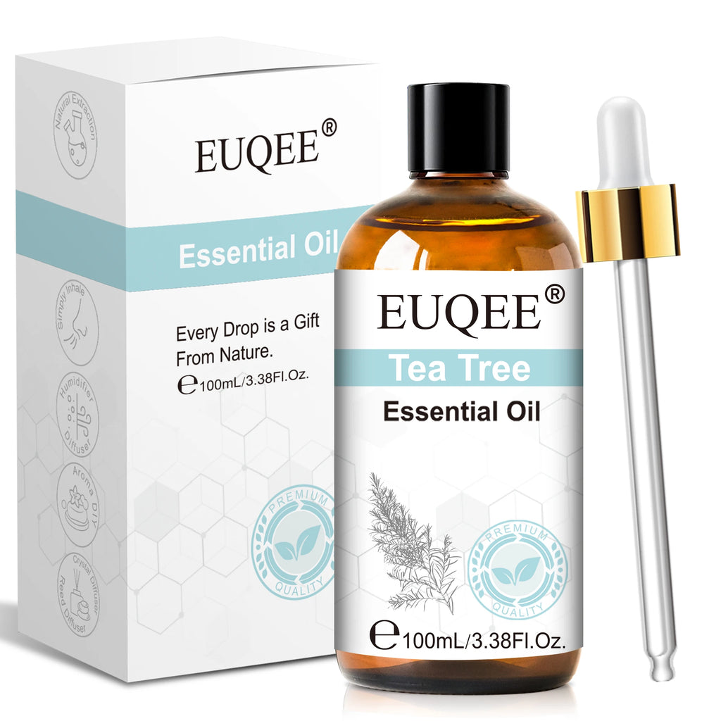 Tea Tree Essential Oil bottle with dropper and packaging on a white background