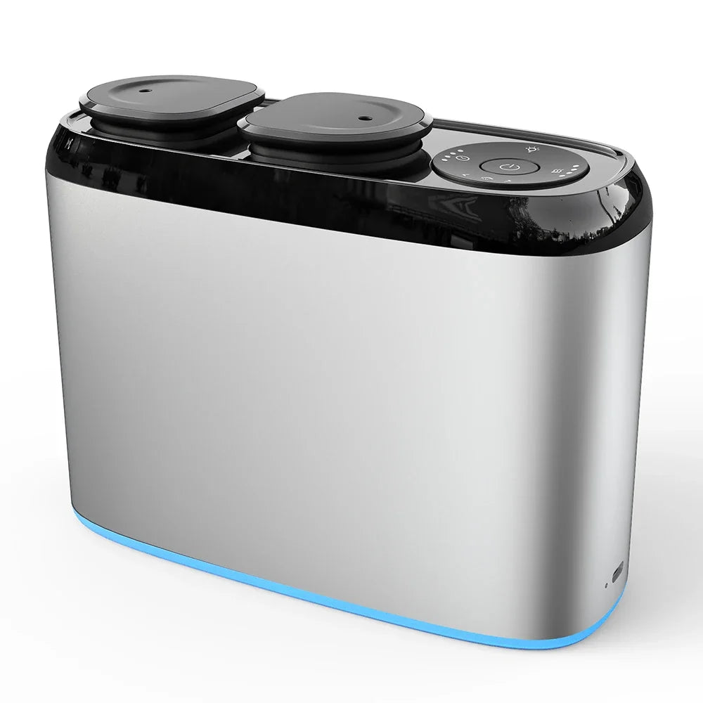 Silver and black diffuser with two black lids on a white background