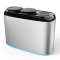Silver and black diffuser with two black lids on a white background