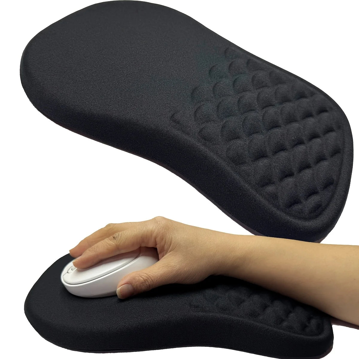 Black wrist rest with a hand using a white computer mouse on a white background
