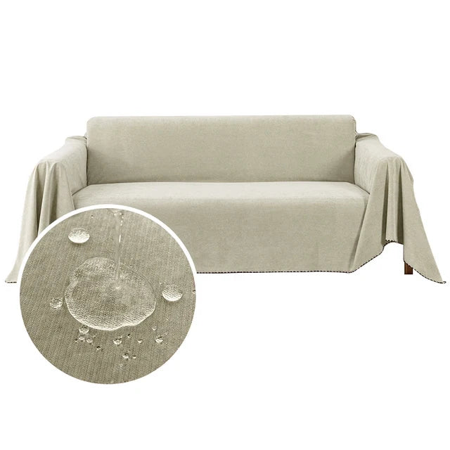Waterproof jacquard sofa cover in soft oat draped over a sofa