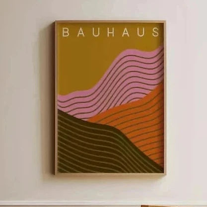 Bauhaus wall art print with pink and orange striped rolling hills on a mustard background