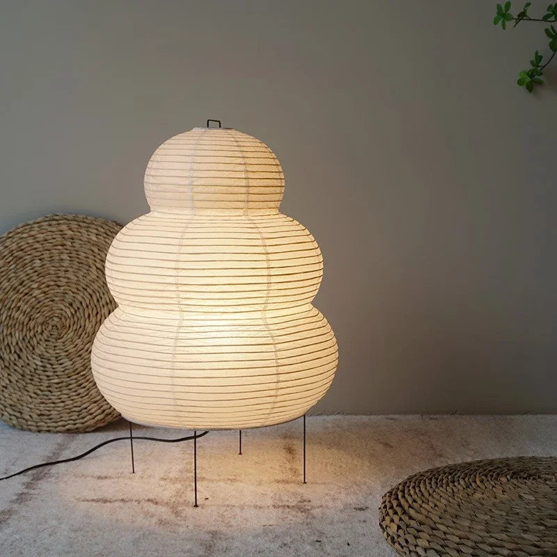 A stylish Japanese lamp on a neutral background with wicker baskets