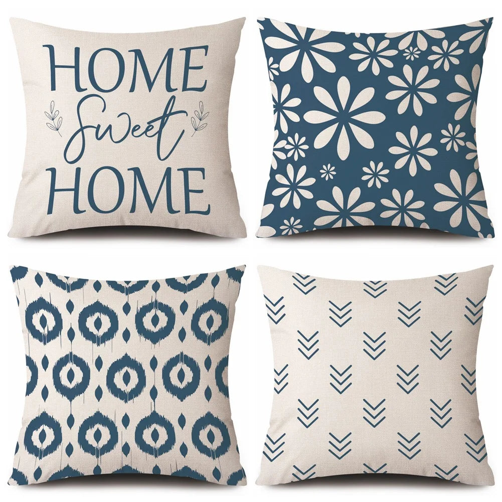Four decorative cushion covers with different patterns and text on a white background