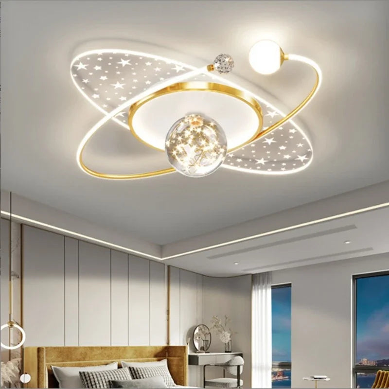 Gold elliptical planet LED ceiling light with gold frame, crystal ball and star panels, 60×60cm.