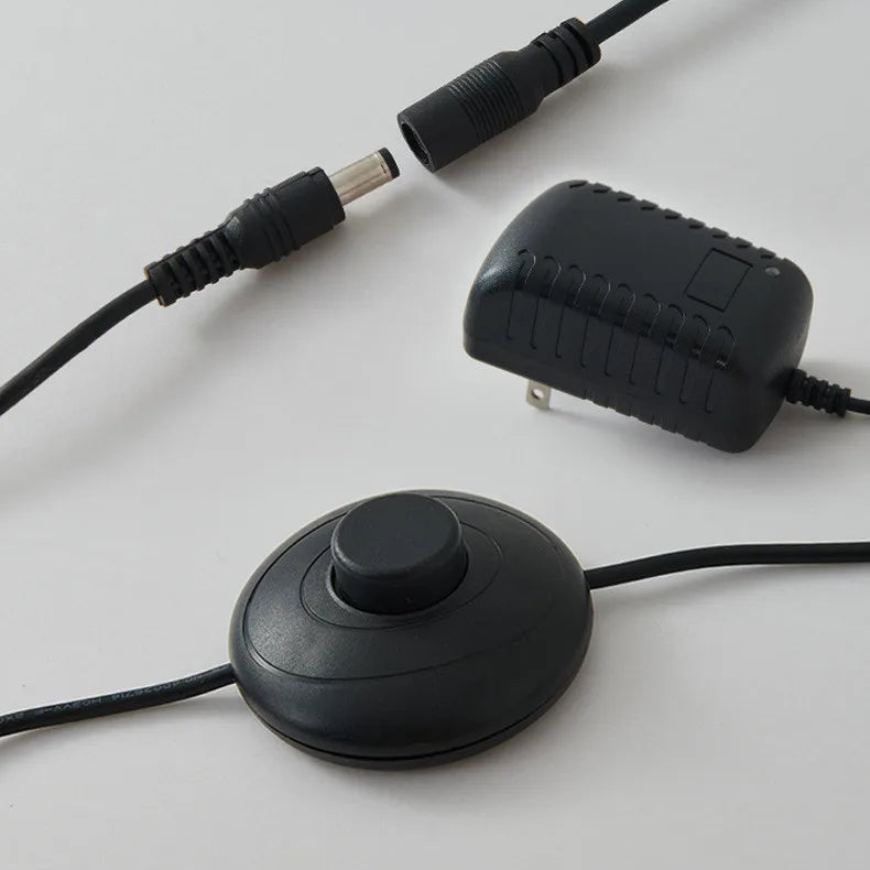 Black foot switch on a white background