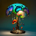 Colourful, floral-stained resin mushroom lamp with artistic metal base