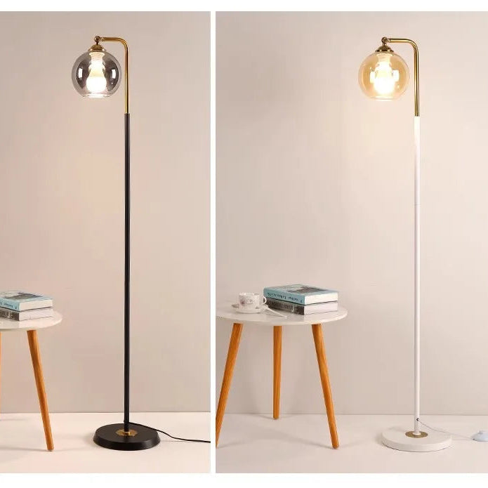 Two floor lamps with different base designs on a neutral background.