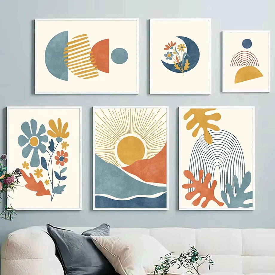 Set of six colourful abstract wall art prints on a gray wall above a white sofa.
