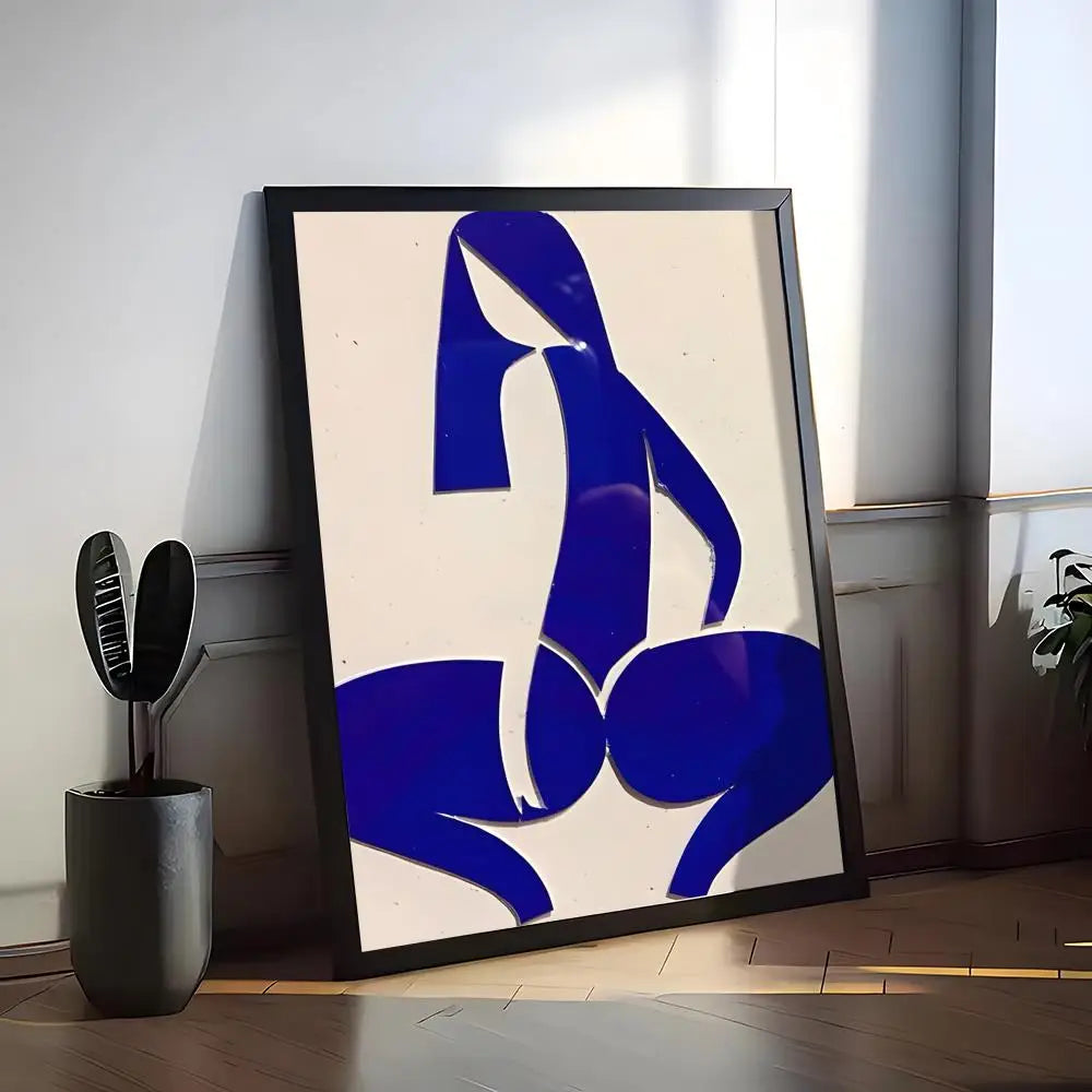 Abstract blue figure painting on white cotton canvas in a black frame.