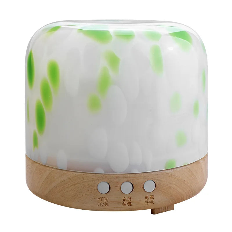 Aromatherapy diffuser with a white and green pattern on a white background