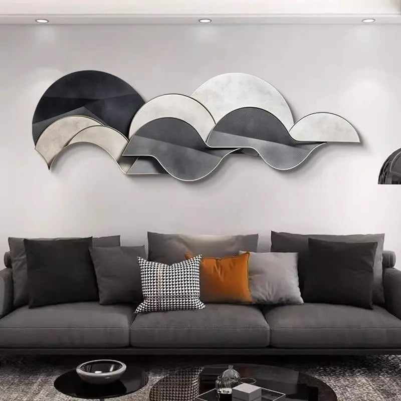 Abstract layered plexiglass wall light in neutral tones styled above a modern grey sofa