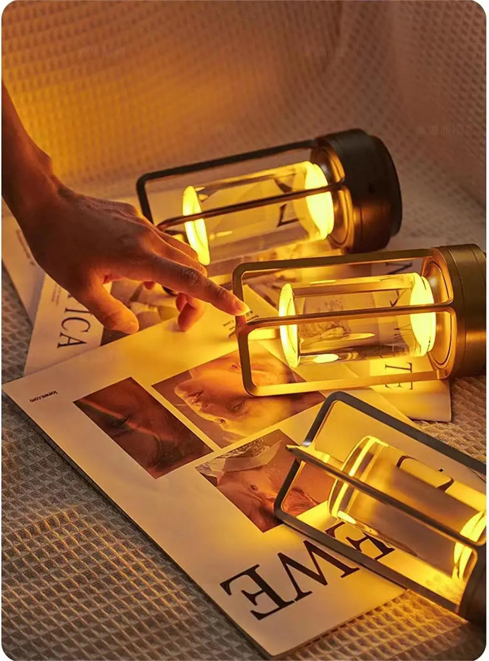 Decorative lamp with a warm glow on a magazine