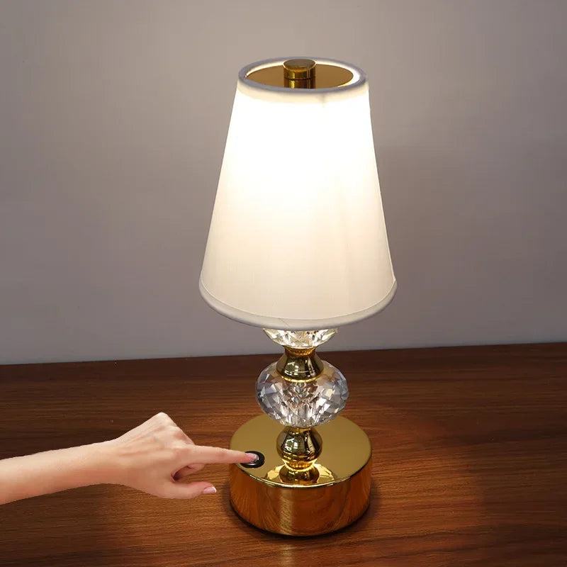 Gold crystal-style table lamp with white fabric shade, 29.5cm