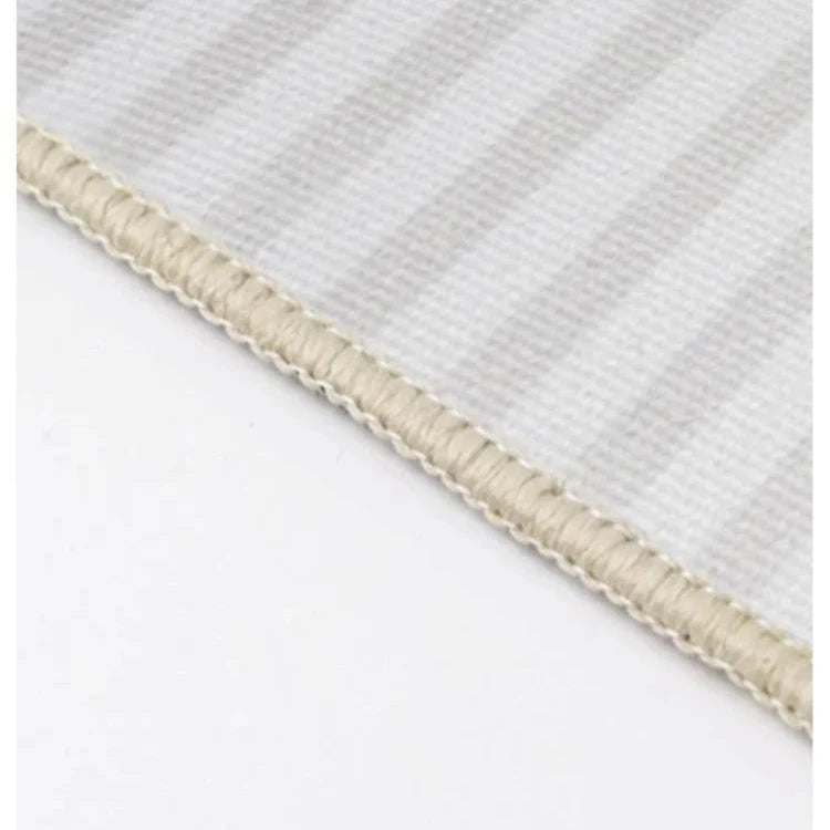 Double coil lock edge of rug.