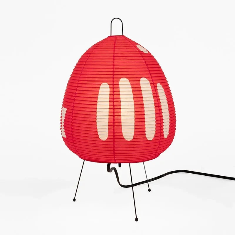 Red lamp with white accents on a white background