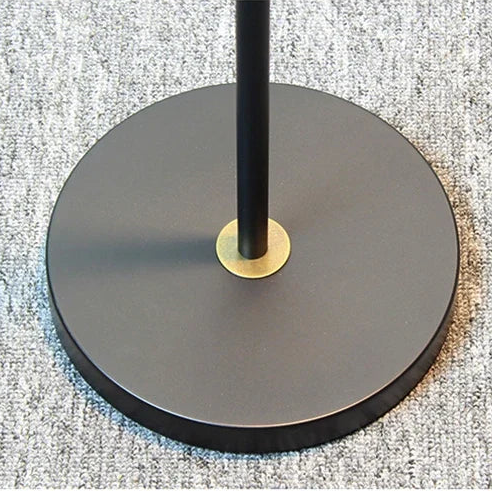 Close-up of stable round base with brass centre detail
