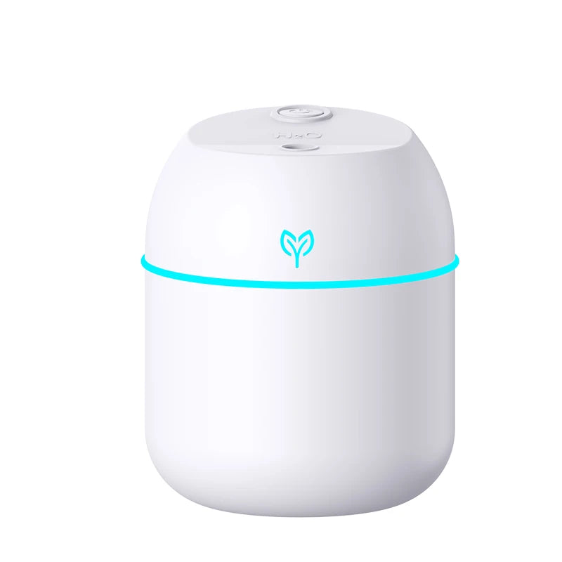 White humidifier with a blue light on a white background
