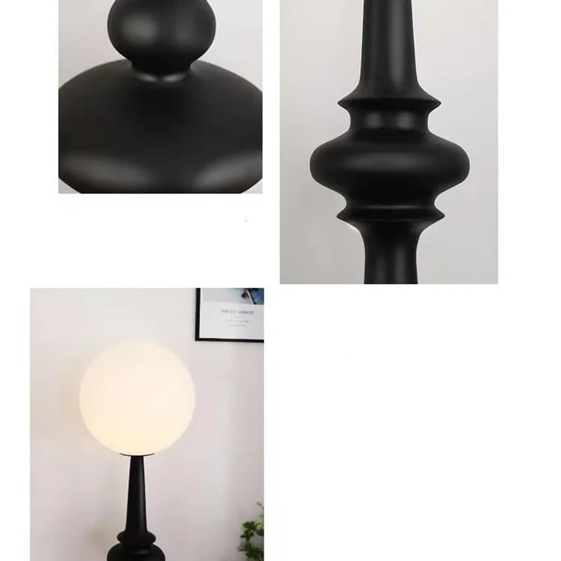 A close up an floor lamp, base, mid, and bulb sections.