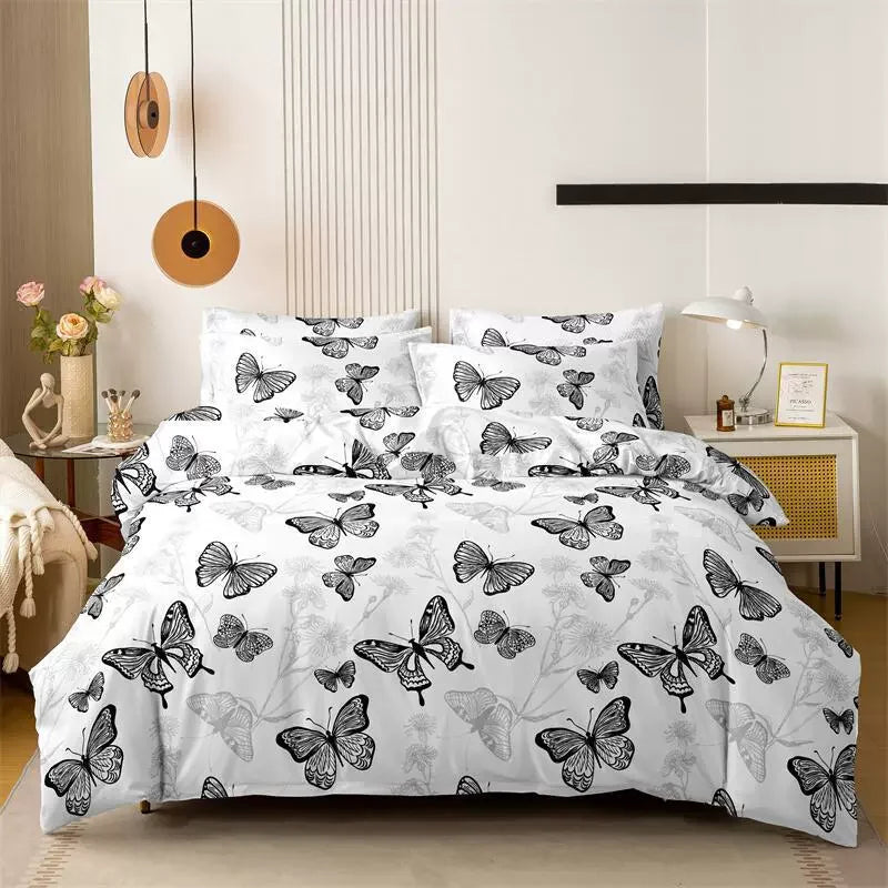 Butterfly patterned bedding set on a bed in a bedroom setting.