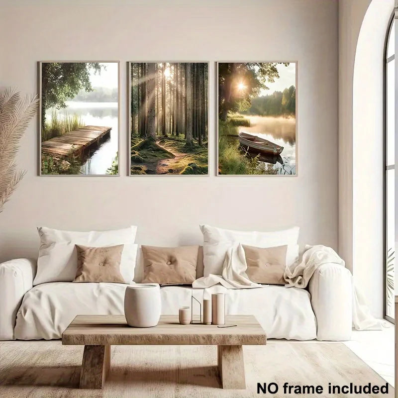 Three framed nature scenes above a white sofa in a living room.
