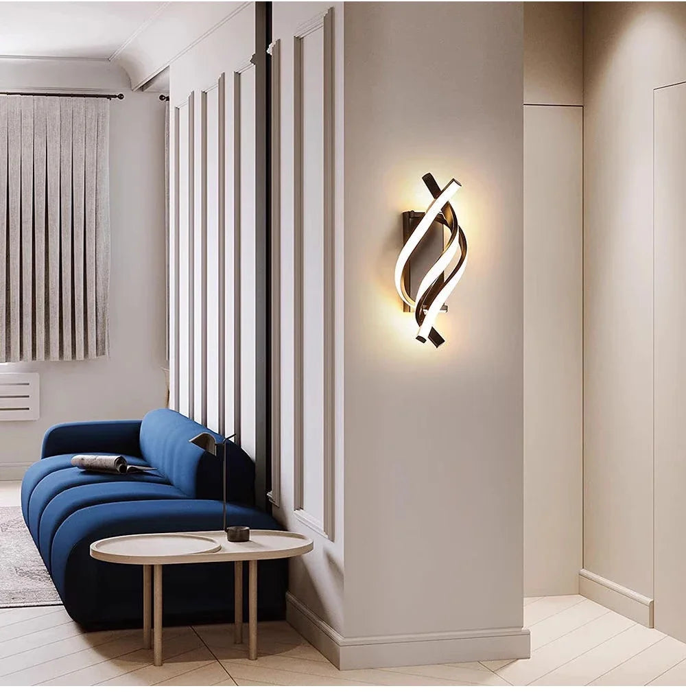 Contemporary spiral LED wall light installed in a modern living room interior