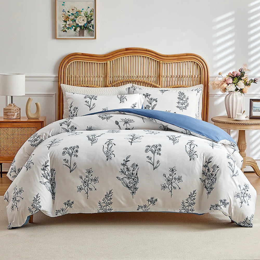 White duvet cover set with black wildflower sketch print and blue reverse detail