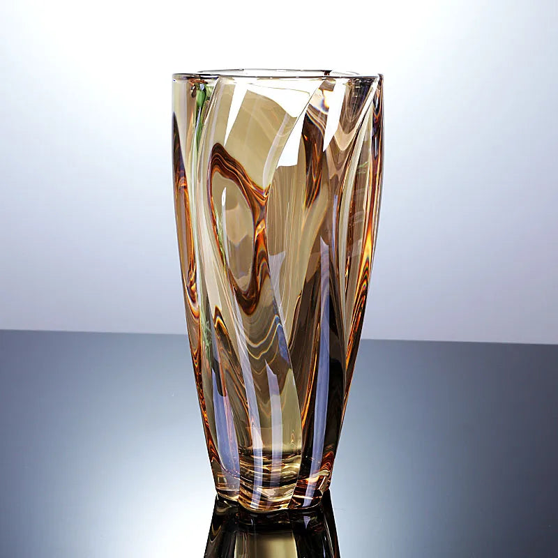 Sunset amber crystal glass vase featuring a rich golden gradient and spiralled texture.