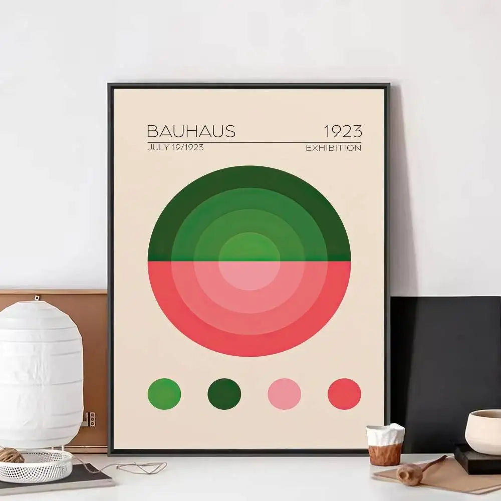 Bauhaus print with layered green and pink circular forms and colour swatches on a neutral background.