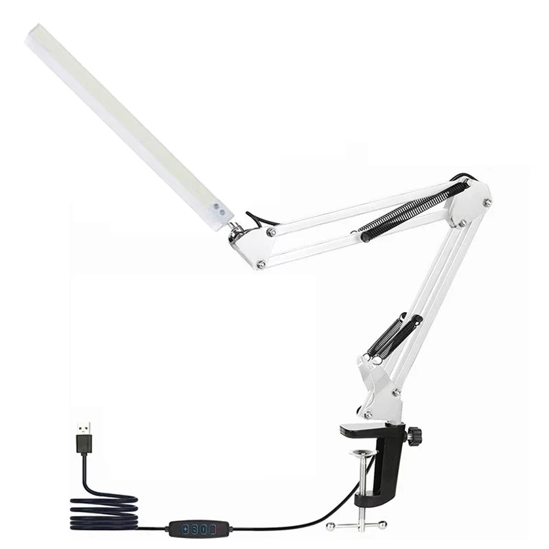 White adjustable microphone stand with USB cable on a white background