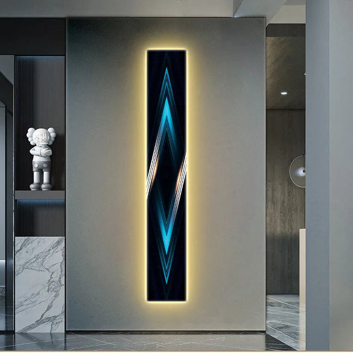 Modern interior with a decorative wall panel featuring geometric design and lighting.