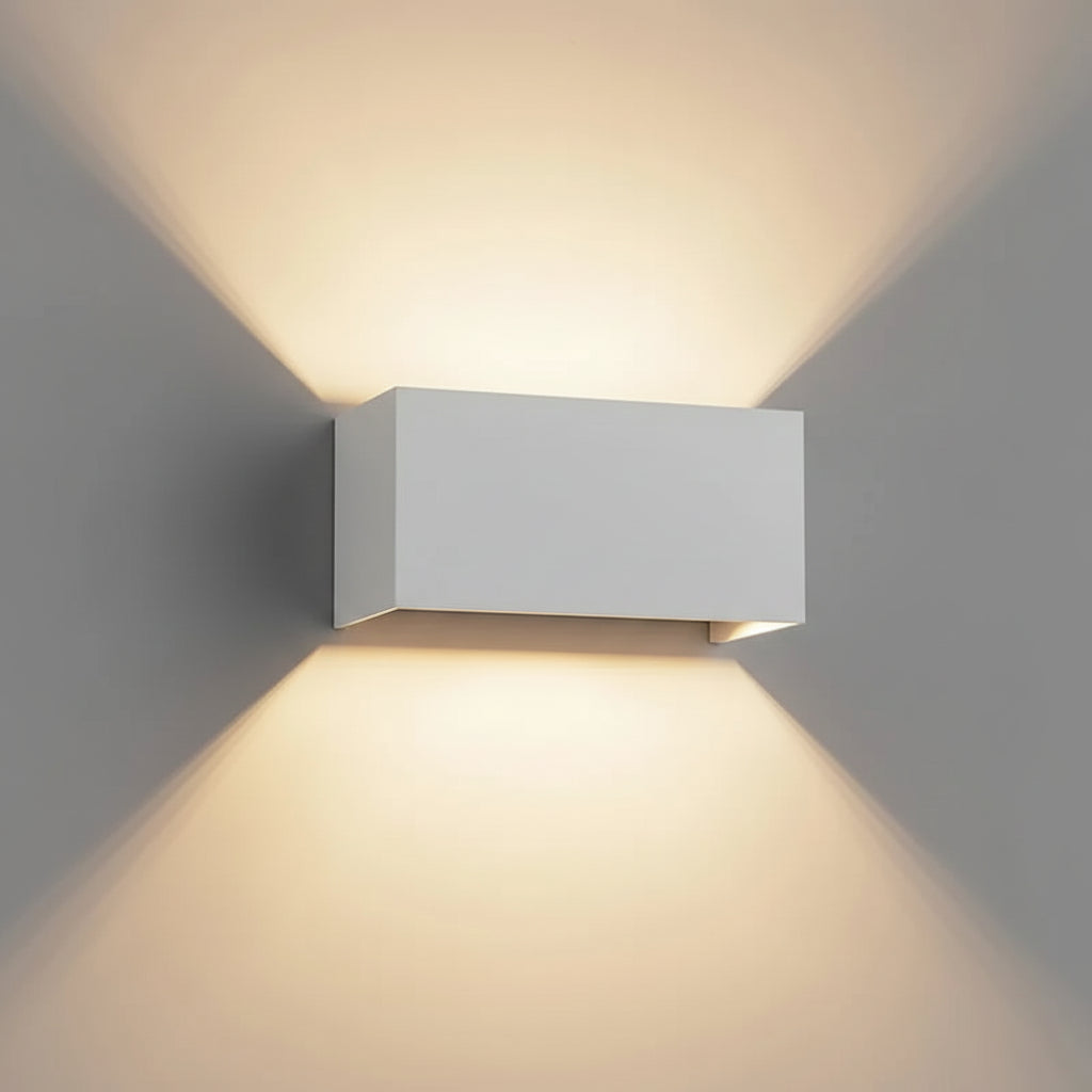White rectangular wall light fixture on a grey wall