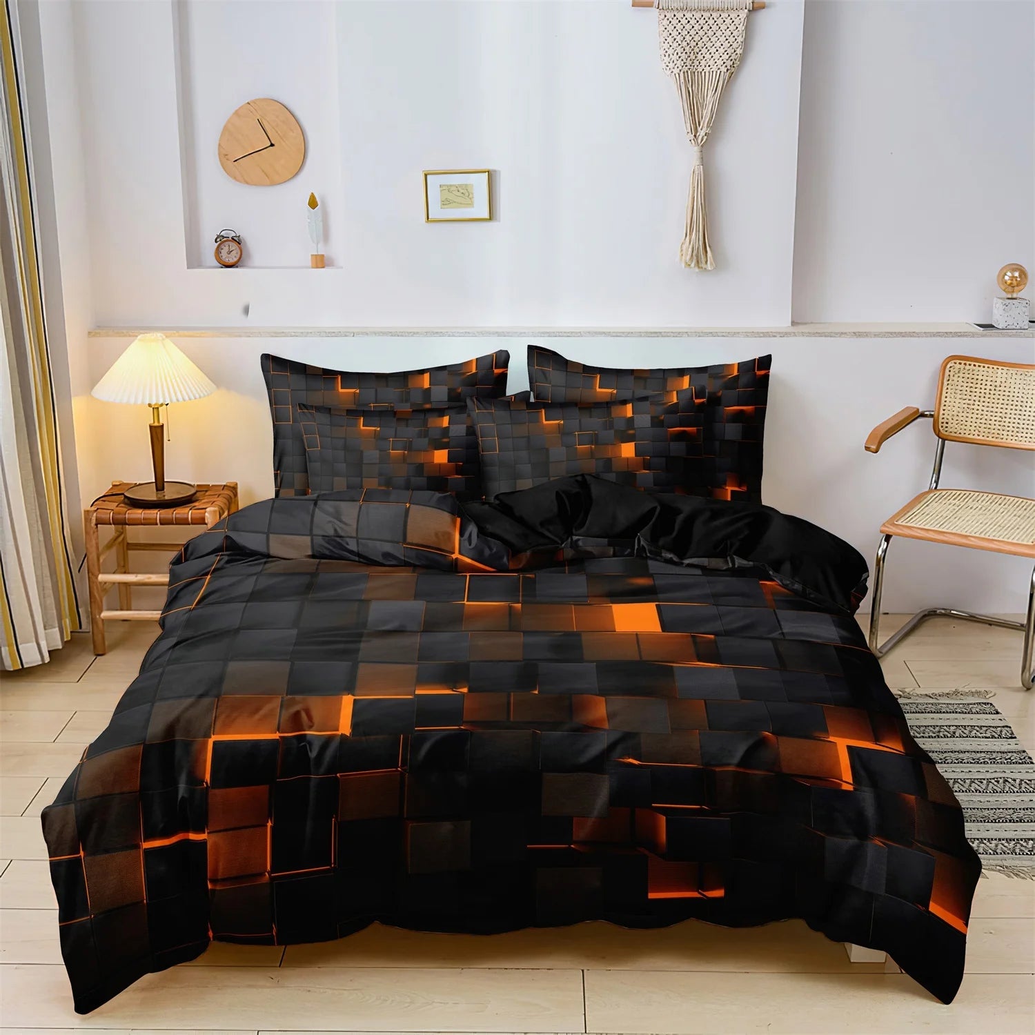 Black bedding set with orange geometric block 3D print and matching pillowcases