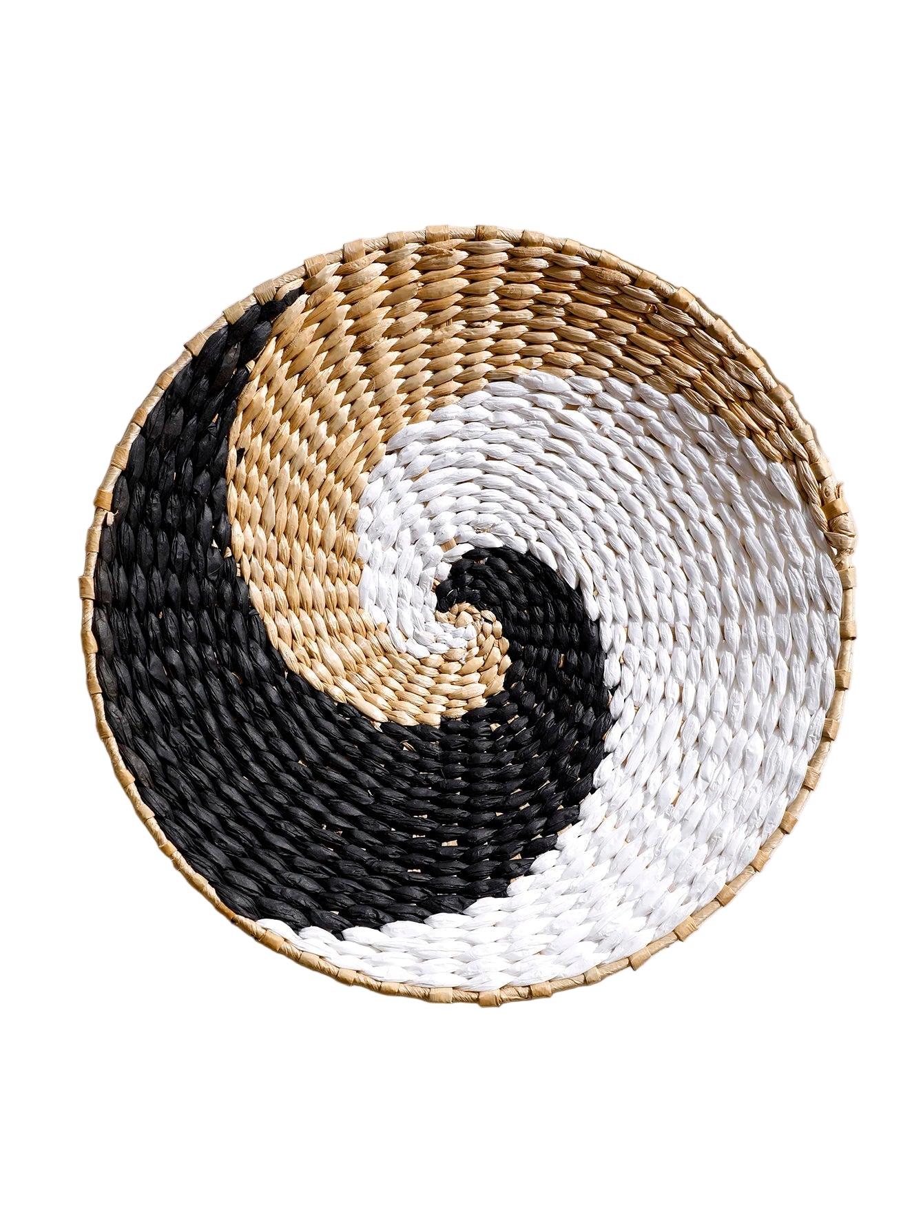 Round woven coaster with black, beige, and white pattern on a light background