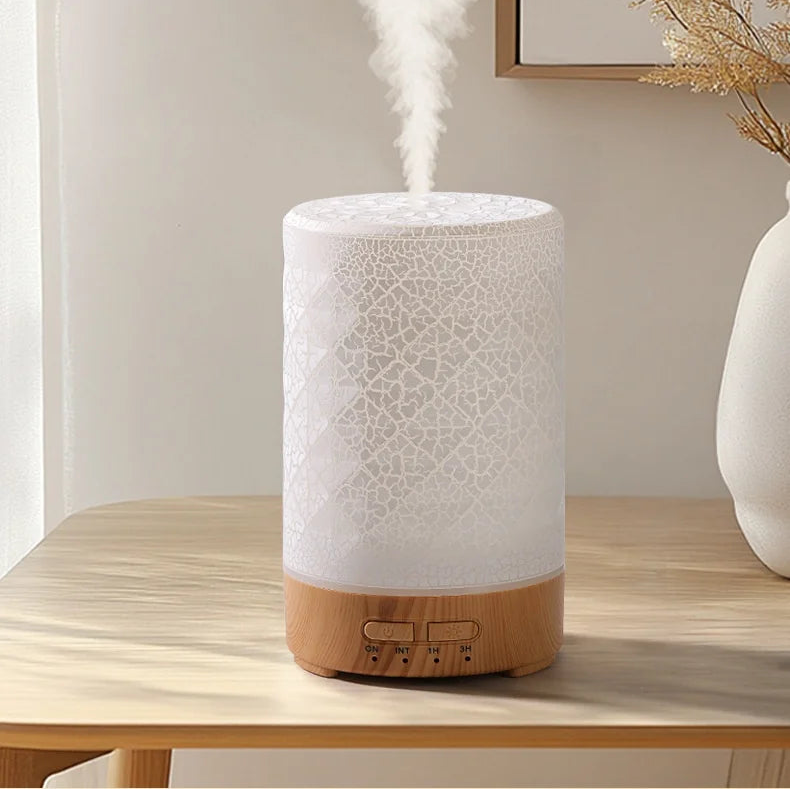 White textured diffuser with wooden base on a wooden surface