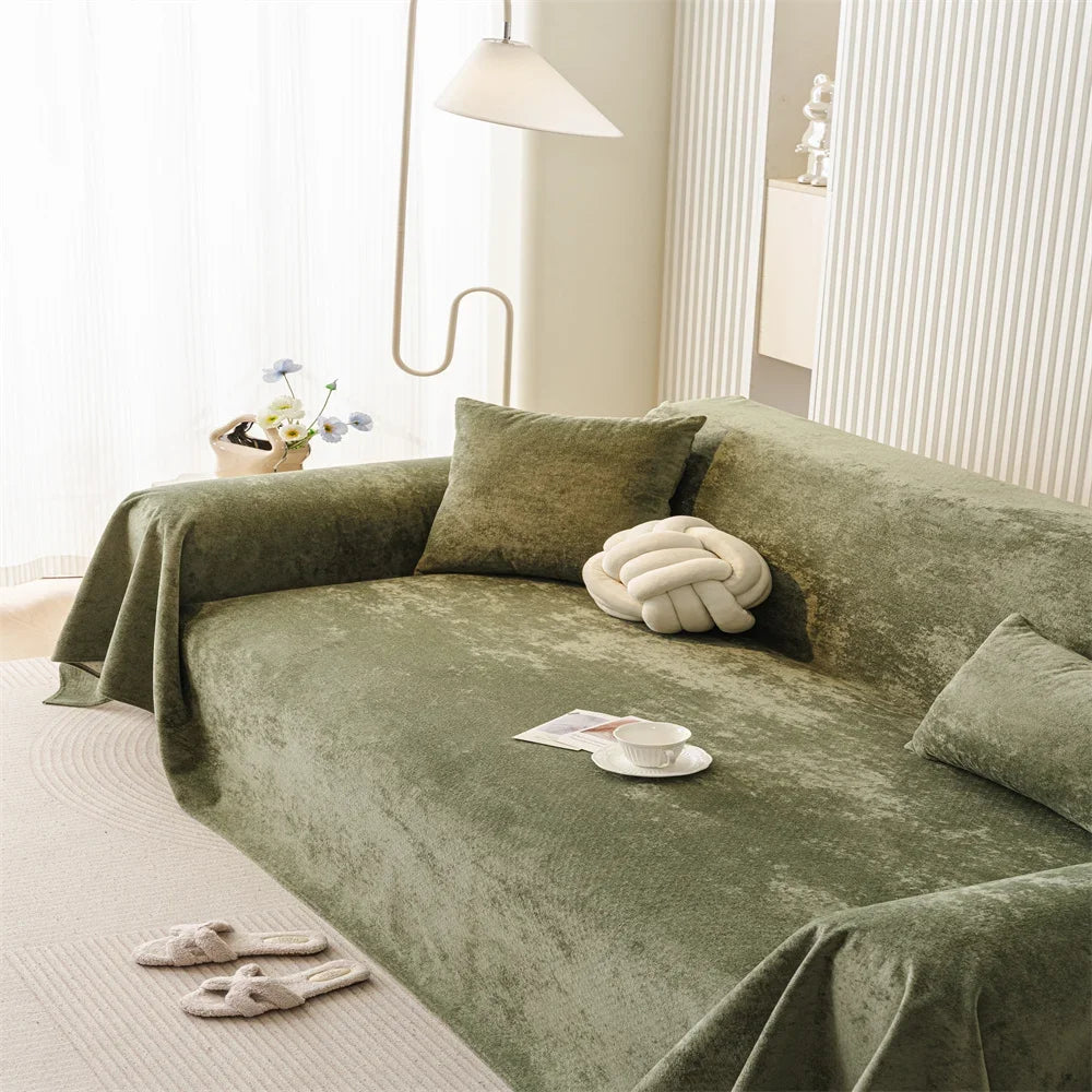 Olive Polyester sofa throw covering a full sofa with a modern decor setting