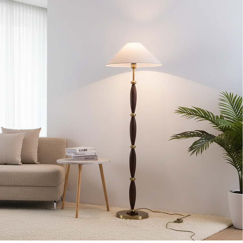 Floor lamp with wooden and brass design on a neutral background