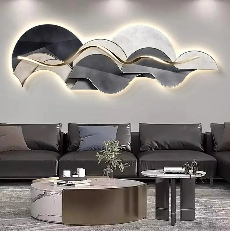 Large sculptural LED wall light with warm backlit glow and wave-inspired abstract design