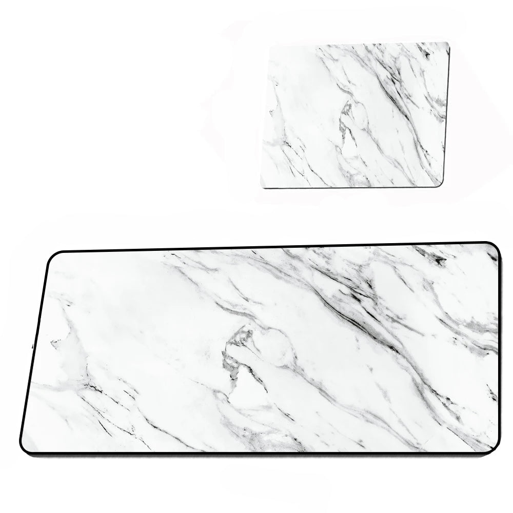 Two marble-patterned mouse pads on a white background