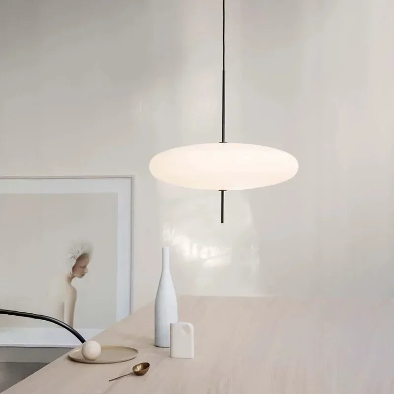 White pendant light fixture in 30cm size with slim black rod detail