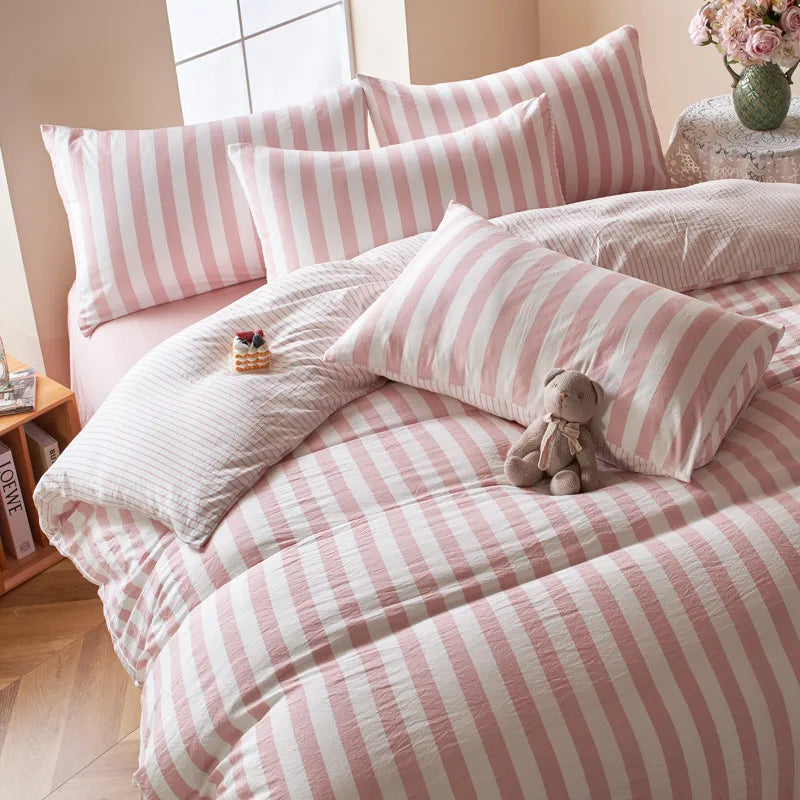 Blush pink and white striped duvet cover set with flat sheet and pillowcases