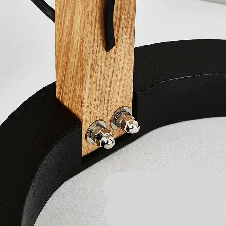 Reinforced black metal base detail with beechwood frame