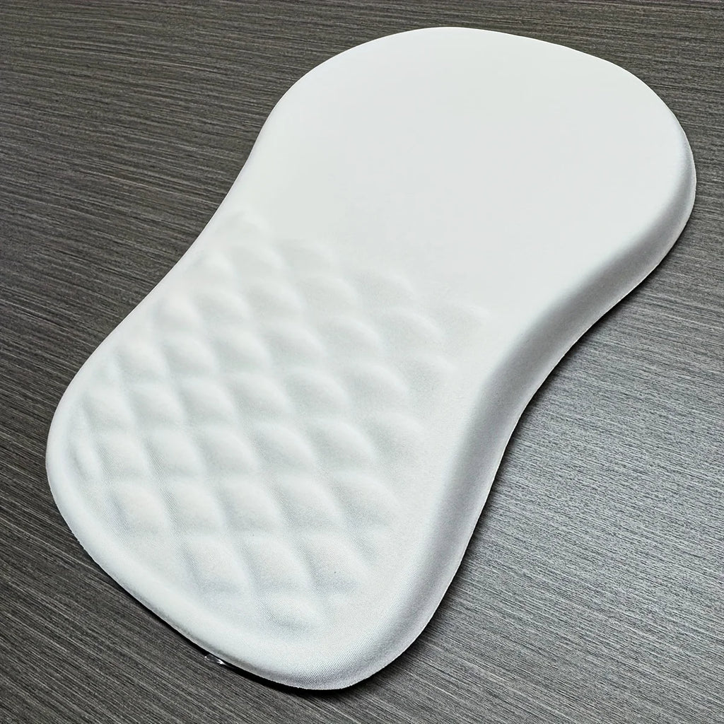 White rubber mouse mat on a grey surface
